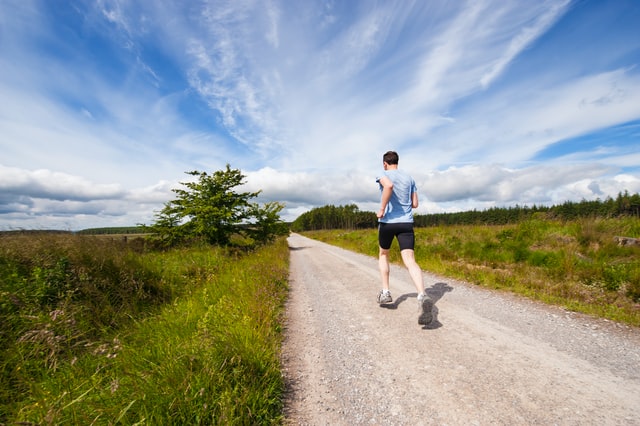 Man running on a road